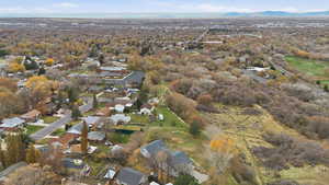 Aerial overview of property's location with nearby suburban area