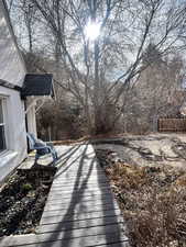 View of yard with a deck