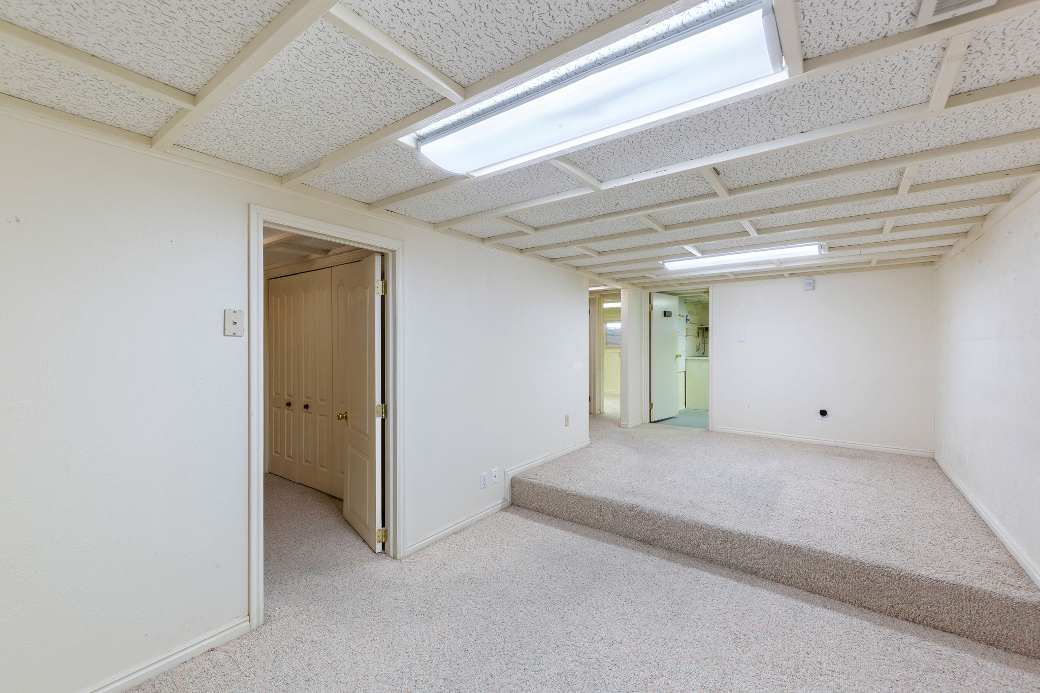 Spare room with carpet floors