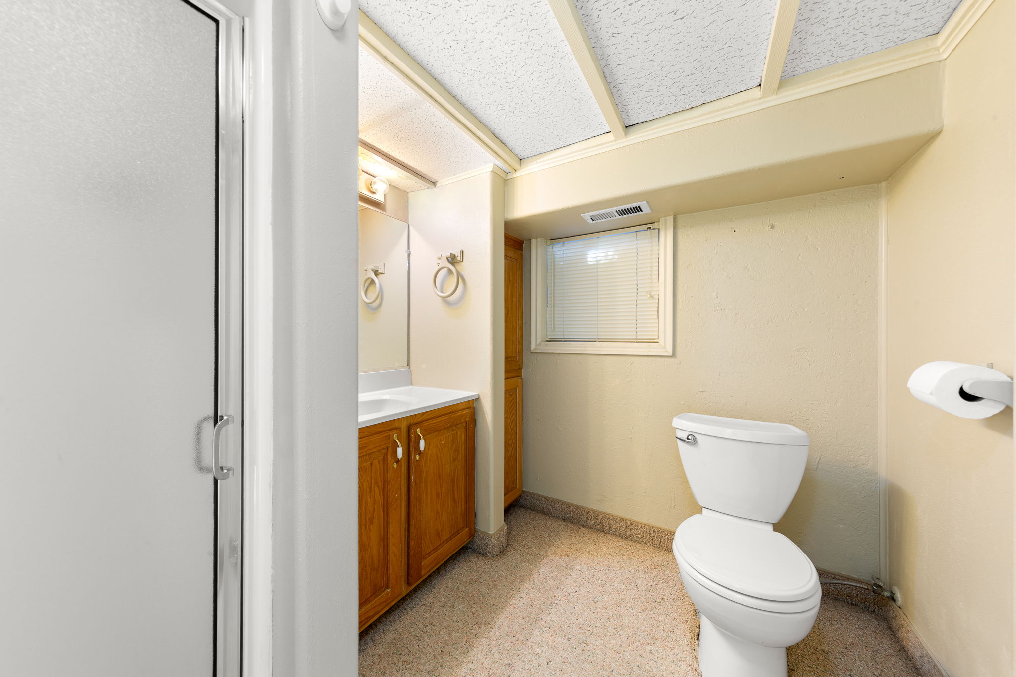 Full bathroom featuring vanity and an enclosed shower