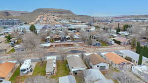 Aerial view of residential area with a mountain backdrop