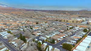 Aerial view of residential area with a mountain backdrop