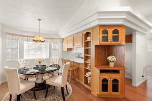 Dining space featuring light wood-type flooring