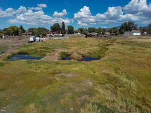 View of yard with a water view and a view of countryside