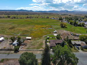 View of property location with rural landscape and mountains