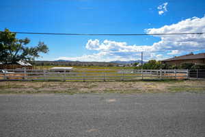 View of yard with a view of countryside