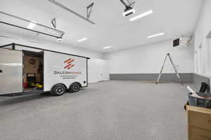 Miscellaneous room with a garage and a heating unit