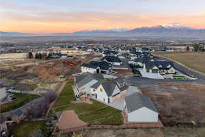 Aerial view at dusk of a residential view and a mountain view