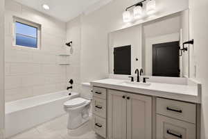 Full bath with washtub / shower combination and vanity