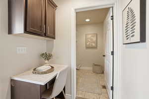 Bathroom with baseboards and recessed lighting