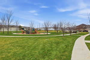 Communal playground featuring a lawn