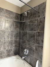 Bathroom featuring shower / bathtub combination