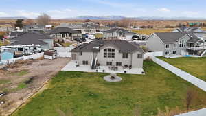 Aerial view of residential area featuring a mountainous background