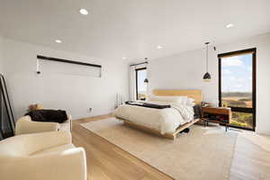 Bedroom featuring light wood finished floors and recessed lighting