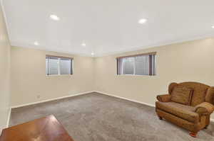 Unfurnished room featuring carpet, recessed lighting, and crown molding