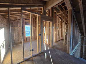 Miscellaneous room featuring lofted ceiling