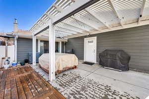 View of patio / terrace featuring a grill, a pergola, and a wooden deck