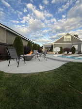 View of patio with an outdoor pool