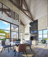 Dining room with hardwood / wood-style flooring, high vaulted ceiling, an outdoor stone fireplace, and a wooden ceiling with exposed beams