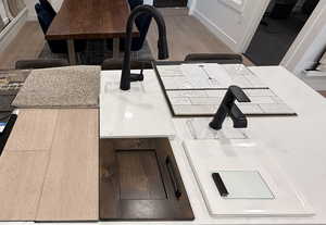 Dining area view of wood finished floors