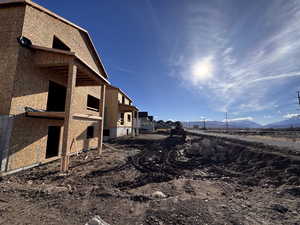 View of yard featuring a patio area and a mountain view