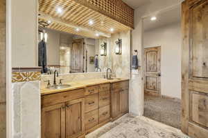 Full bathroom featuring double vanity