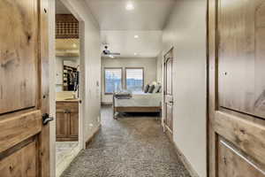 Bedroom with light colored carpet, recessed lighting, and ceiling fan