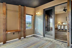 Unfurnished bedroom featuring carpet and a closet