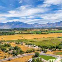Aerial view of sparsely populated area with a mountain backdrop