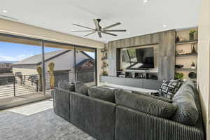 Living room featuring ceiling fan