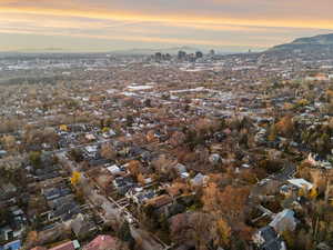 Aerial overview of property's location with a mountainous background
