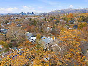 Aerial view of property's location with nearby suburban area and skyline