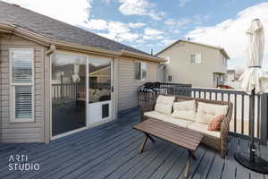 Deck with an outdoor hangout area