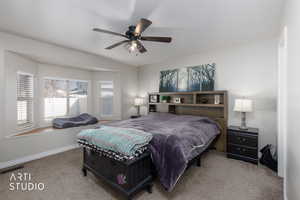 Bedroom with carpet flooring and a ceiling fan