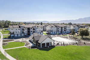 Aerial perspective of suburban area with a mountain backdrop