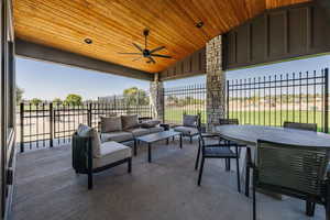 View of patio featuring ceiling fan, outdoor lounge area, and outdoor dining area