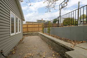 View of fenced backyard