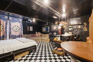 Bedroom featuring tile patterned floors