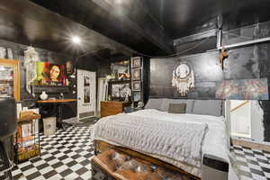 Bedroom featuring tile patterned floors