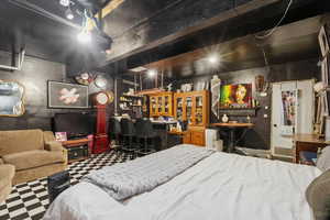 Bedroom featuring tile patterned floors