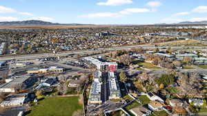 View of property location featuring a mountain backdrop and a highway