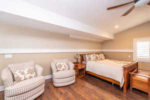 Bedroom featuring lofted ceiling, wood finished floors, a ceiling fan, and recessed lighting