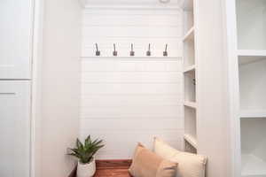 Mudroom with wood finished floors