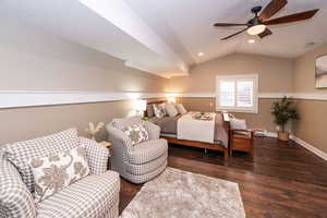 Bedroom featuring dark wood-type flooring, lofted ceiling, ceiling fan, recessed lighting, and a baseboard radiator