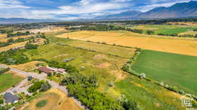 Aerial view of sparsely populated area featuring a mountainous background