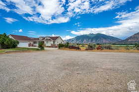 View of front of house with a mountain view