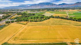 Overview of rural landscape with mountains and extensive farmland