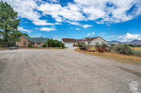 Single story home featuring driveway