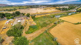 View of property location featuring a mountainous background and rural landscape