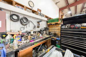 Misc room with a workshop area